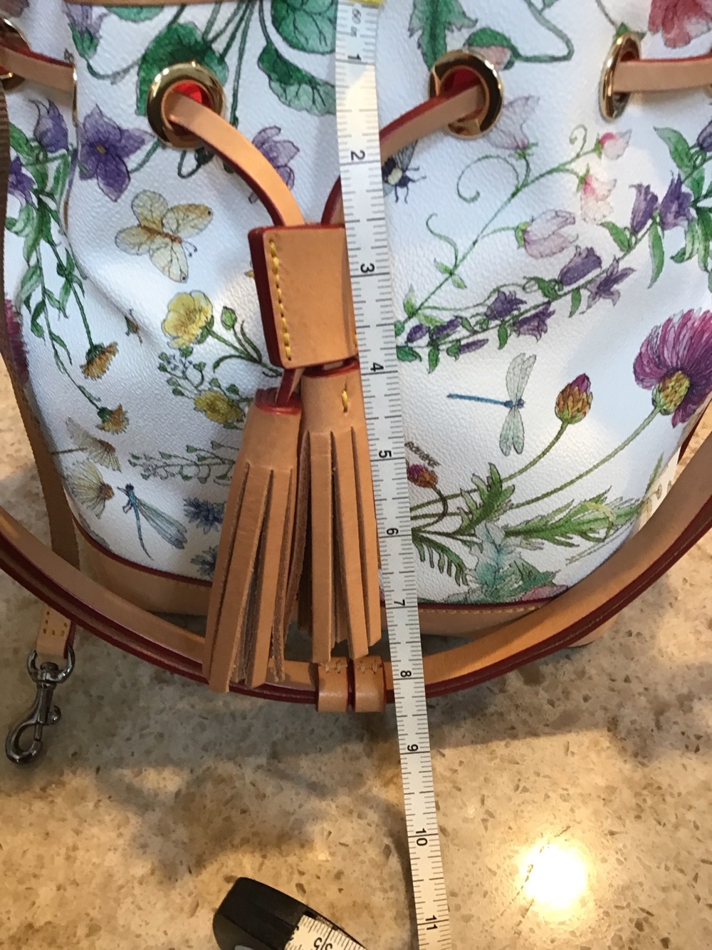 Dooney & Bourke White Floral Drawstring Tassel Bucket Bag with Tan Trim - Picture 4 of 8